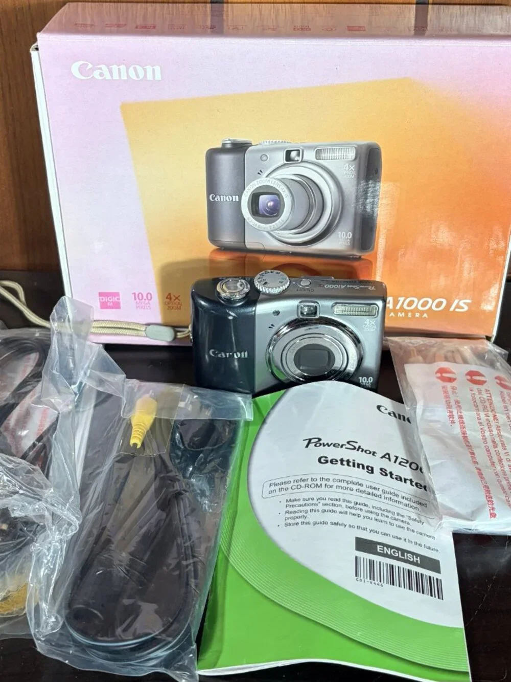 Canon PowerShot A1000 IS 10MP 4x Zoom Digital Camera w/ Box & Manual Tested